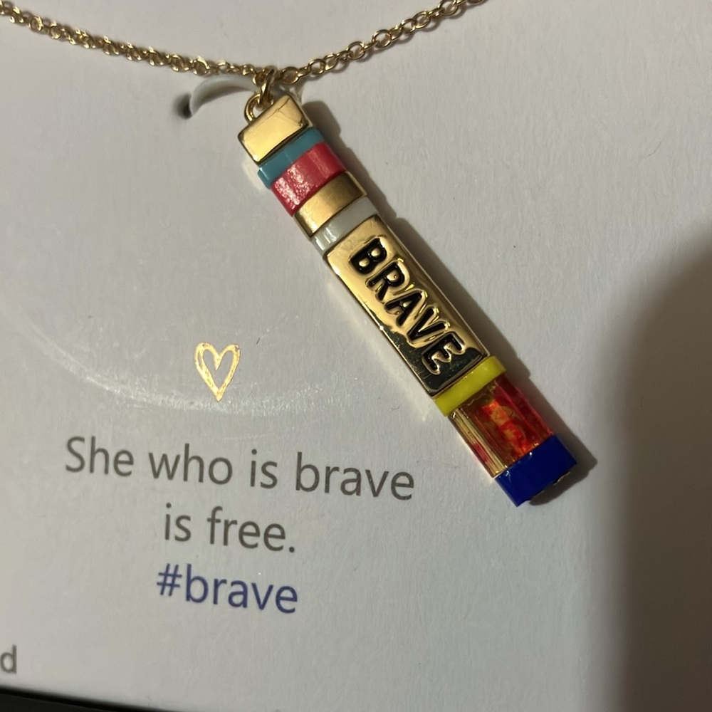 New with tag, she rocks pendant“BRAVE “